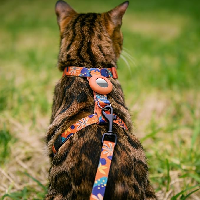 Cat Harness and Leash Set with Airtag Holder for Walking & Travelling, Escape Proof Cat Harness for Small Medium Large Kitten, Adjustable Lightweight Soft Cat Vests(Orange Print)